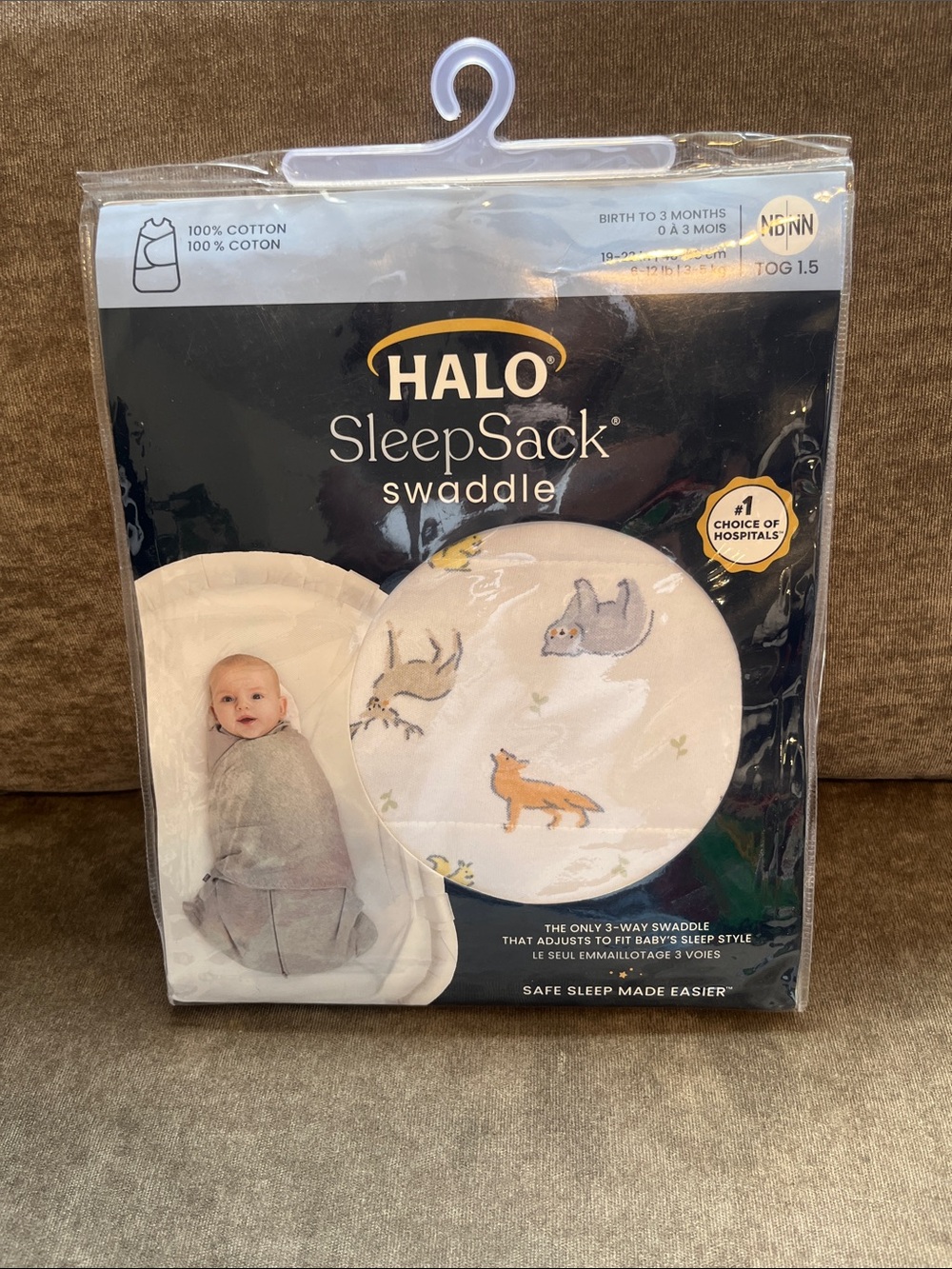 Halo SleepSack Swaddle in White with Orange & Gray Woodland Print